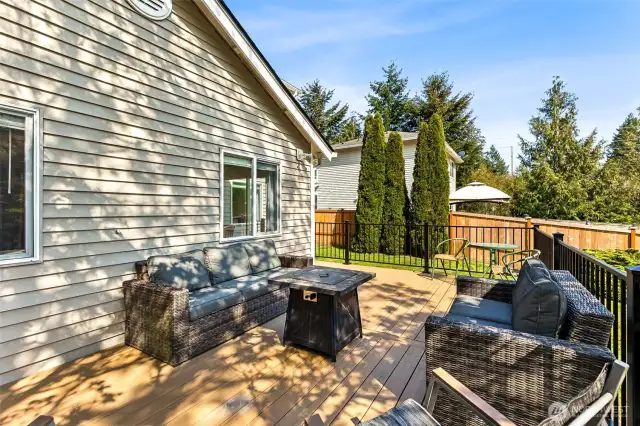 Plenty of space for outdoor dining and entertaining. Wrought iron railings.