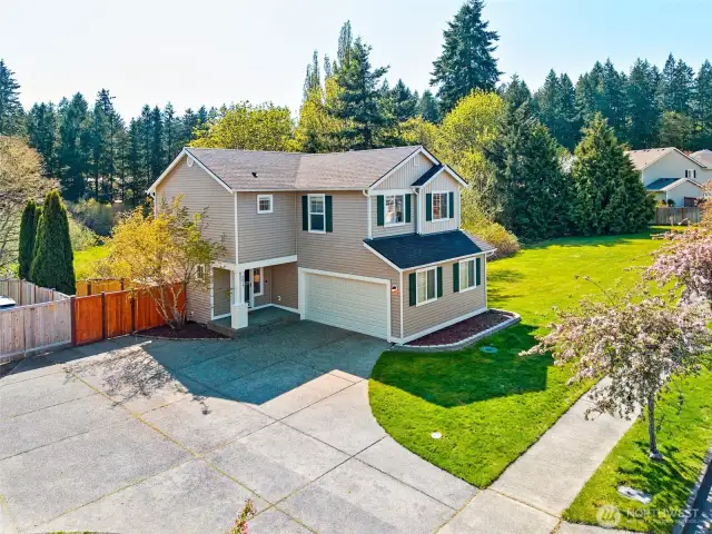 Check out the HOA maintained flat greenspace adjacent to the home.