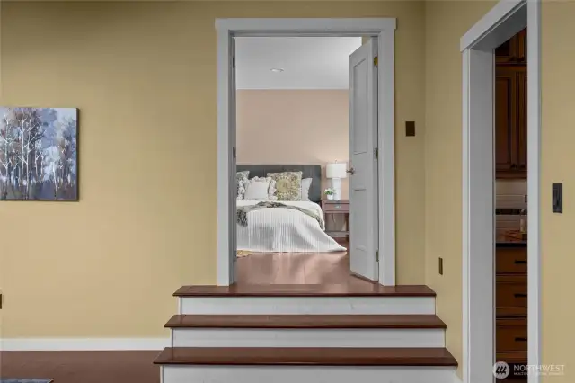 3 steps up into primary suite