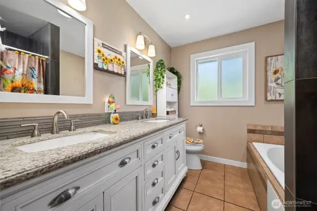 Main bathroom with soaking tub and shower