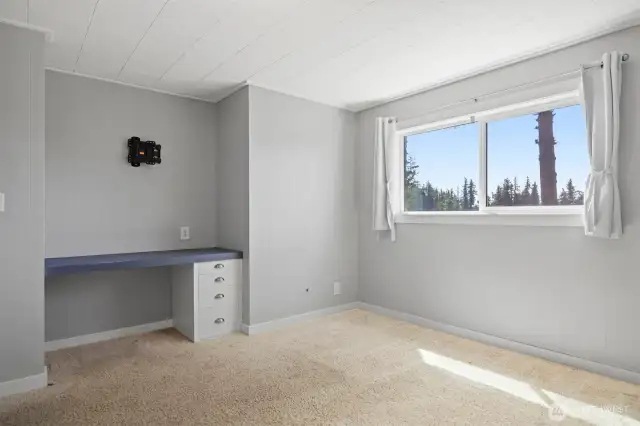 Downstairs bed with built in study area.