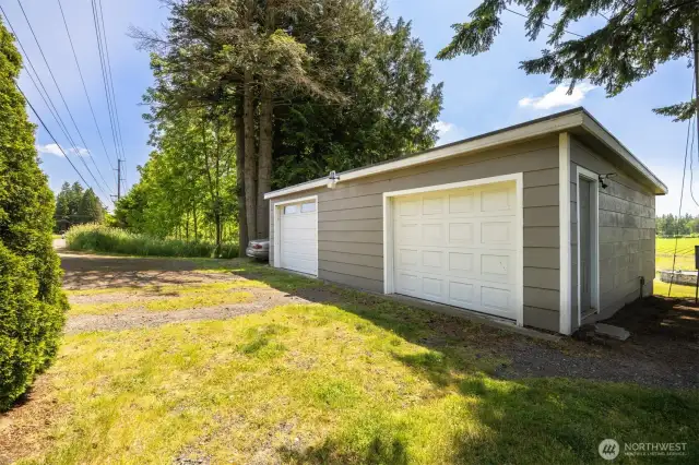Detached Garage with two separate rooms.  Right side has stove, both sides have power.