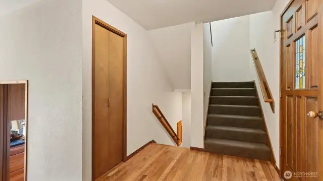 Entry and stairs to upper and lower floors