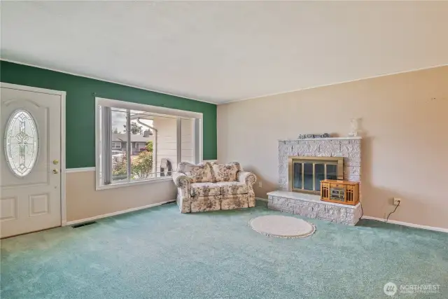 Seller says HARDWOOD FLOORS underneath all carpet!
