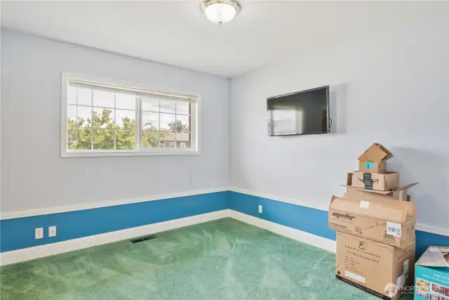2nd Bedroom (how nice would it look if there really are hardwoods under there?)