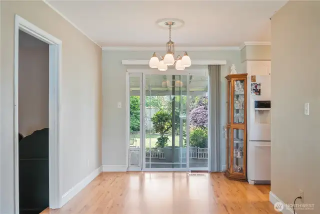 Dining area off of the LR and Kitchen, with Slider to back patio