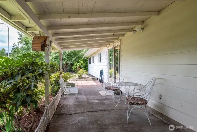 Covered back patio can be accessed by Sliding Doors off the Dining area and the Family Room