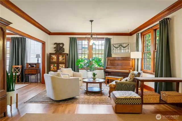 The open main floor is grand, with cozy gathering spaces.
