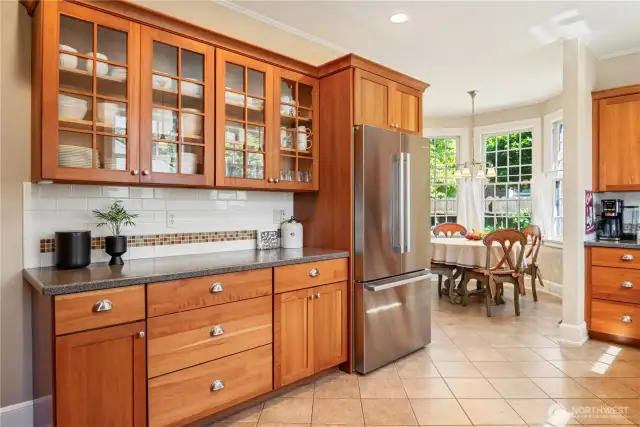 Glass front cabinetry to display your favorite dishware.