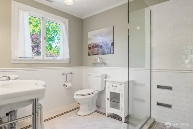 All of the bathrooms are wonderfully updated, maintaining the character of the home.