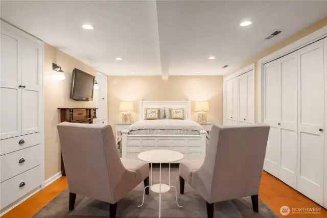 The fully finished lower level features a second fireplace, built-ins and direct access to the back yard.