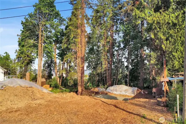 Welcome to 4954 Highland Dr. This bay view property is ready to build with all the permits in place. Even the building plans are available.