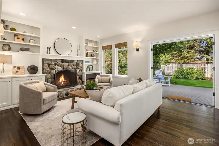 The family room with wood burning fireplace.