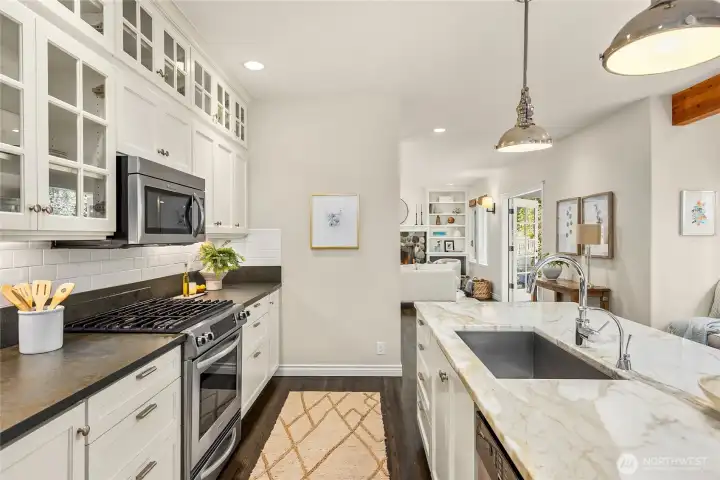 Beautiful marble countertops adorn the kitchen island.