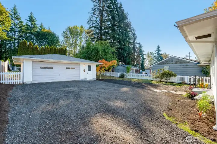 A newly installed propane line from the side of the garage to the house services the tankless water heater. New grass seed installed. Refreshed front and back landscaping. Just painted exterior.