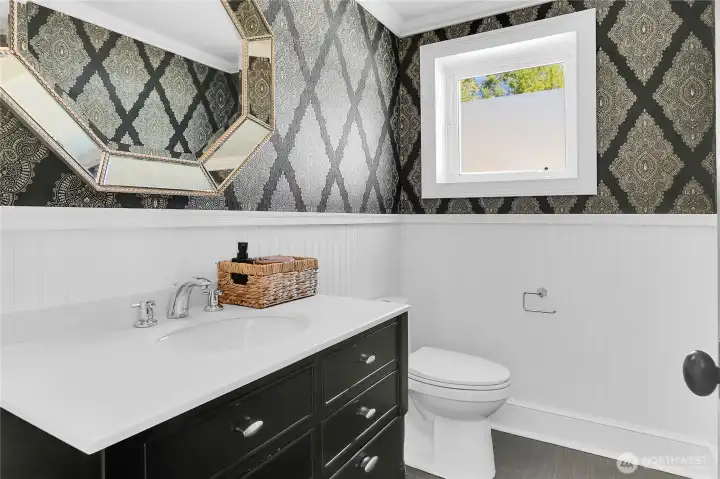 Convenient main-floor bathroom thoughtfully designed for guests and everyday use.