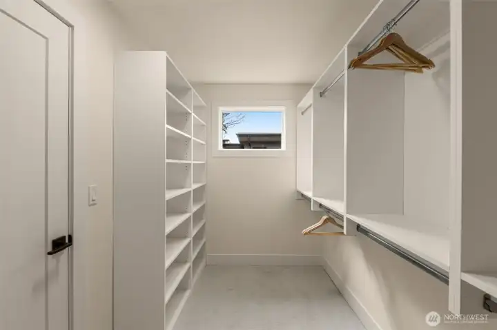 Primary suite walk-in closet.