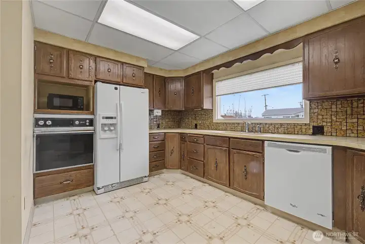 Kitchen has loads of countertop and cabinet space