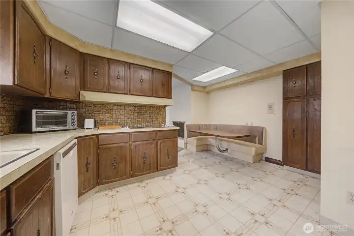 Charming built-in breakfast nook and there's a Dutch door to the garage