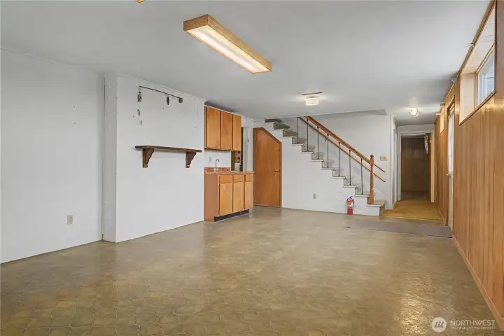 Basement bonus room with a wet bar
