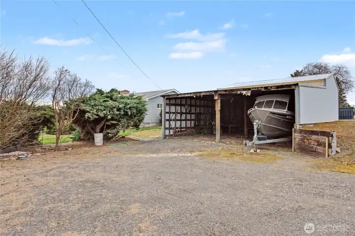 Overside carport off the back of the shop