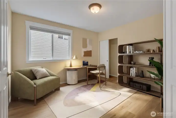 Main Floor Bedroom. Virtually Staged as a Home Office concept.