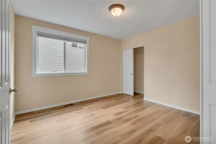 Main Floor Bedroom. Full Bath around the corner makes a great guest room, MIL, or an ideal Home Office.