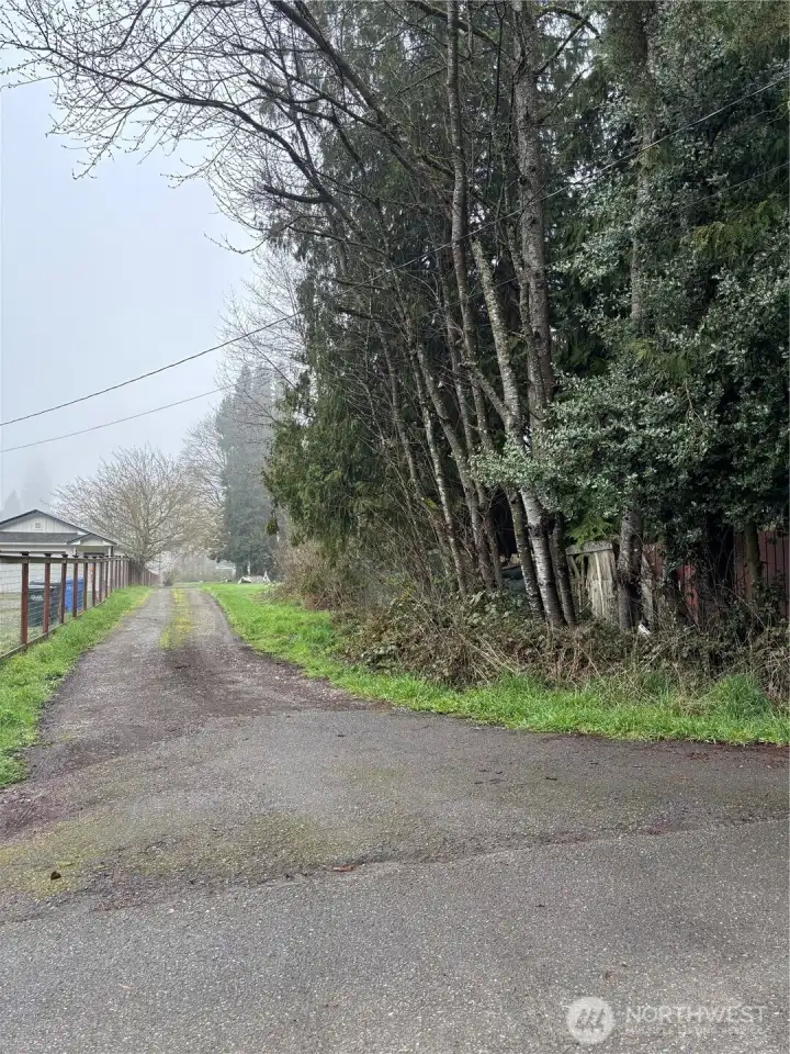 Drive way to enter 3320 and back of 3312