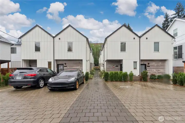 Looking at front of home and parking Looking at front of home and parking