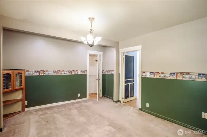 Primary bedroom with walk through closet & French doors to the deck.