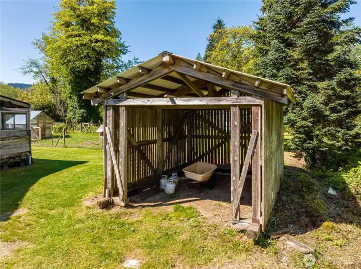 Large wood shed or could be used to store a boat or?
