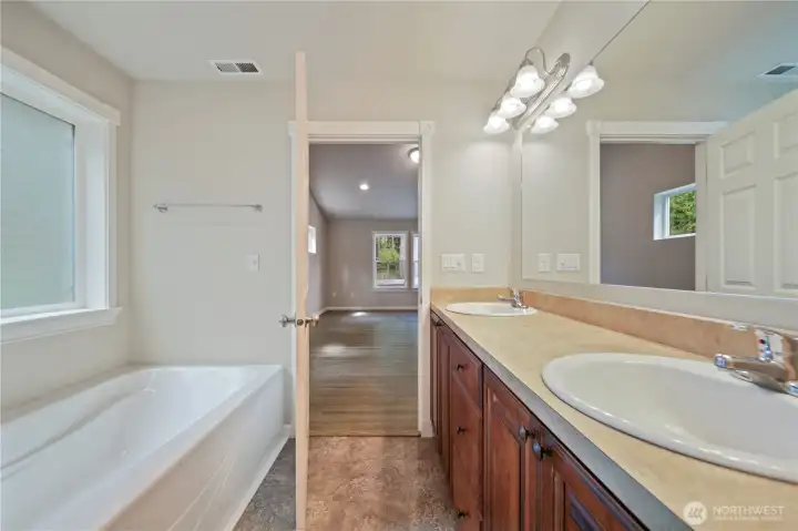Primary bath with soaking tub.