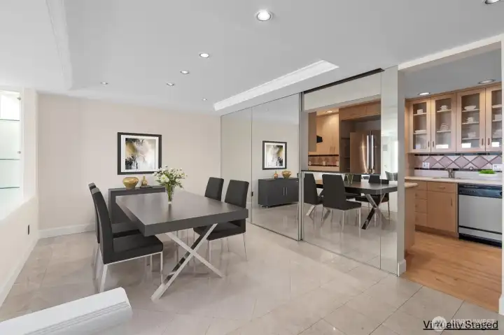 Formal dining area with tile floors. Formal dining area with tile floors.