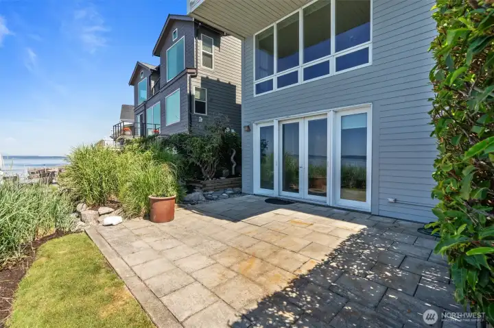 This is anything but your average condo. If your idea of outdoor living extends beyond a small balcony, you'll love this exceptional waterfront retreat. The spacious paved patio and private grassy yard provide the perfect setting for lounging in the sun, dining al fresco, or entertaining friends—all with the beauty of the waterfront as your backdrop. This is anything but your average condo. If your idea of outdoor living extends beyond a small balcony, you'll love this exceptional waterfront retreat. The spacious paved patio and private grassy yard provide the perfect setting for lounging in the sun, dining al fresco, or entertaining friends—all with the beauty of the waterfront as your backdrop.