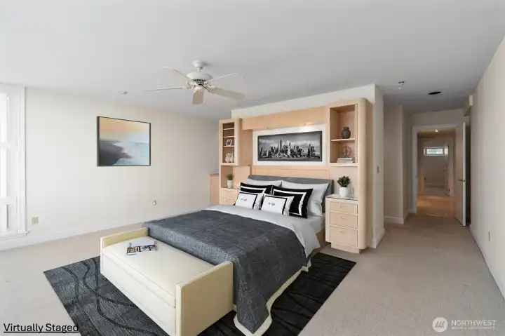 Another view of the Primary suite. To the right is a view into the second en-suite bedroom on this level. Another view of the Primary suite. To the right is a view into the second en-suite bedroom on this level.