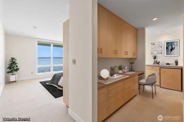 The primary suite is a true retreat, complete with a dedicated office area and a built-in mini fridge. It's the perfect place to spend an entire weekend taking in the ever-changing marine traffic and spectacular sunsets. The primary suite is a true retreat, complete with a dedicated office area and a built-in mini fridge. It's the perfect place to spend an entire weekend taking in the ever-changing marine traffic and spectacular sunsets.
