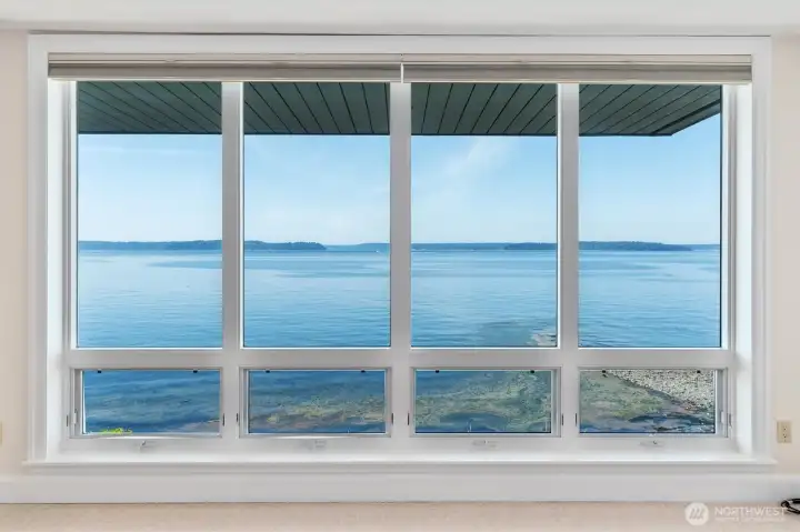 Floor to ceiling windows in Primary suite. Floor to ceiling windows in Primary suite.