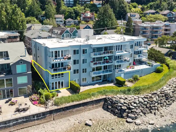 Perfectly sited along the waterfront, Unit #102—outlined in yellow here. In this photo you can see the waterfront patio and a grassy area just off the living room. Perfectly sited along the waterfront, Unit #102—outlined in yellow here. In this photo you can see the waterfront patio and a grassy area just off the living room.
