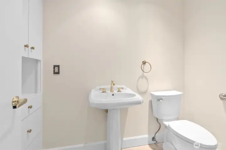 This two-level waterfront residence offers the convenience of a half bath on the main living level. This two-level waterfront residence offers the convenience of a half bath on the main living level.