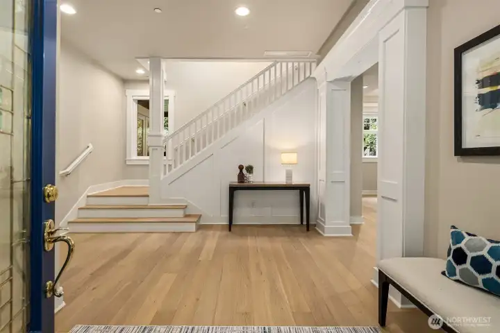 Soaring 10-foot ceilings, new European white oak engineered floors, and elevated architectural details establish an elegant tone from the moment you arrive.