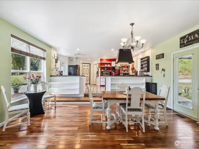 Spacious dining room, Kitchen, separate Laundry room and entry to the garage.