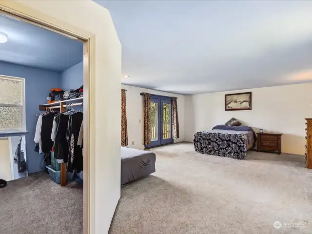 Graciously large primary bedroom, with walk-in closet and ocean facing balcony.