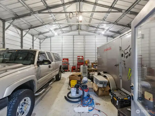 SHOP -3 bays 2 man doors. (left side)