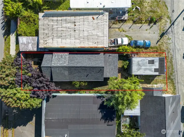 This 3,000 sq ft lot is in C-1 zoning, which gives the flexibility of seeing the property as a home to fix up, a rental investment, or a potential business space. Building sizes in this zone are limited for compatibility with the residential area. *Lot lines are approximate*