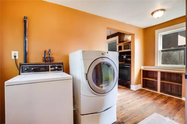 The laundry area includes this washer and dryer.