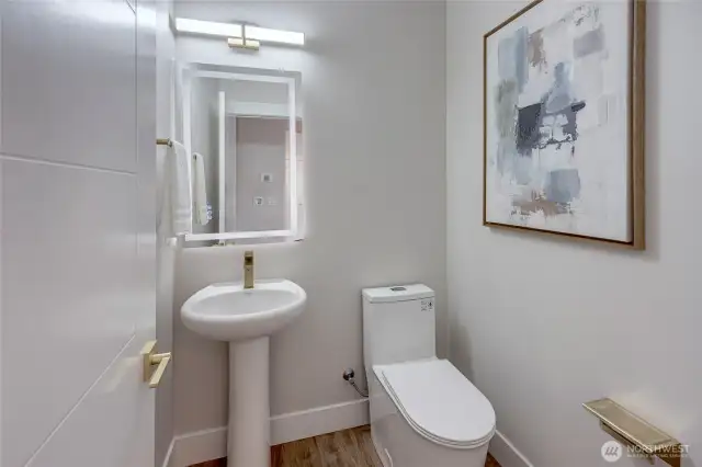 downstairs 1/2 bath (model home lot 1A, colors may vary)