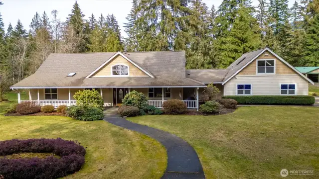 Welcome to 6170 Rutsatz Road - a 7.3 acre equestrian estate nestled on the Nooksack River, surrounded by the Cascade foothills.