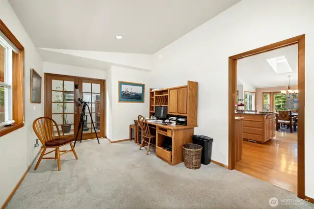 A large office sits off the kitchen with access from the front hall as well.