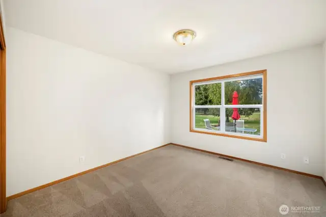 One of 2 additional  bedrooms, this one looks over the back patio