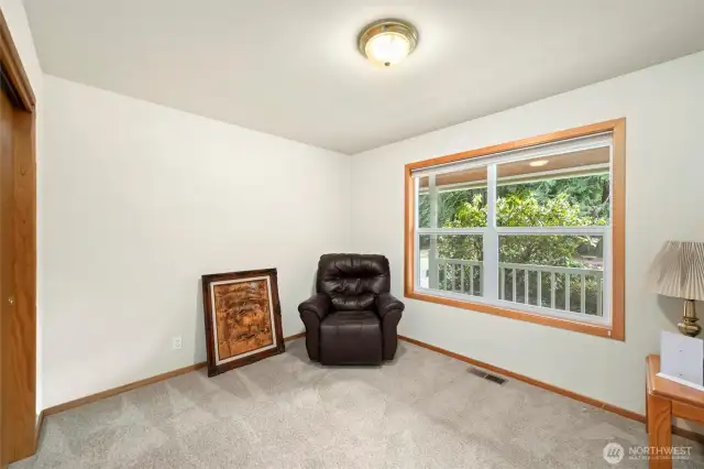 The other additional bedroom looks out at the front of the home